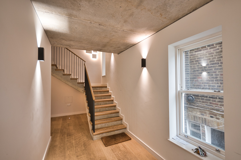 Professional electrician performing electrical installation in Honeybourne